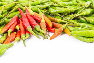 A set of fresh hot and spicy red and green bird-chilli on white space