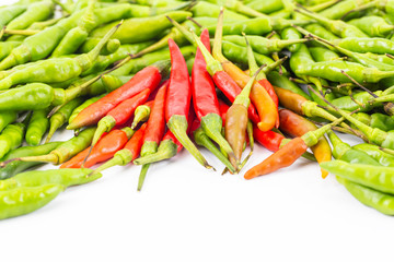 A set of fresh hot and spicy red and green bird-chilli on white space