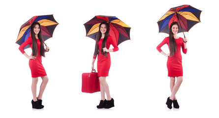 Woman with suitcase and umbrella isolated on white