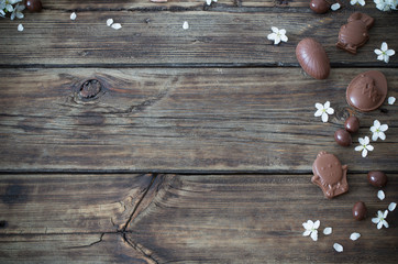 chocolate eggs on dark wooden background