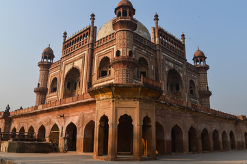 Fototapeta premium A mesmerizing view of safdarjung tomb memorial from the side of lawn at winter morning.