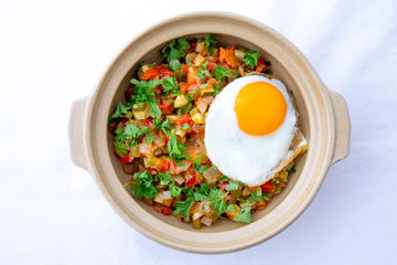 Spanish dish pisto manchego with fried egg