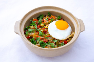 Spanish dish pisto manchego with fried egg