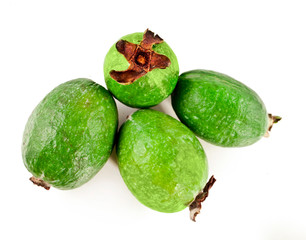 Fresh feijoa fruits (acca sellowiana, pineapple guava) isolated on a white background. Top view.