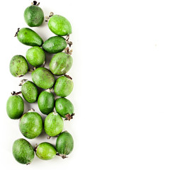 Fresh feijoa fruits (acca sellowiana, pineapple guava) isolated on a white background. Top view. Text space.