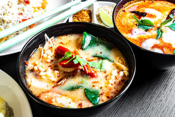 Authentic Tom Yum Soup or Tom Yam Kung is a traditional hot spicy sour soup, typical dish in Thailand, usually cooked with shrimps.