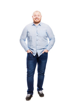 Smiling fat redhead man with a full length beard. Isolated over white background. Vertical.