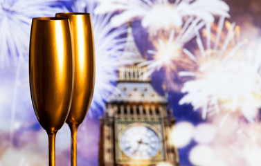champagne glasses and fireworks  new year in London
