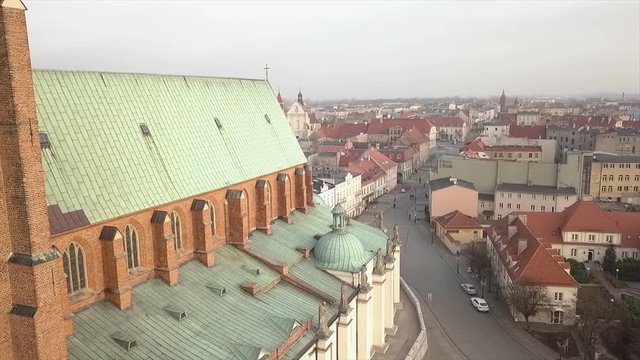 Drone footage of old Cathedral located in Poland. Name of the city is Gniezno.