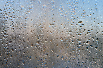 Drops on glass. Close-up background
