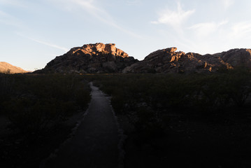 Rocks lit up during sunset at Hueco Tanks, Texas. 