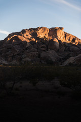 Rocks lit up during sunset at Hueco Tanks, Texas. 