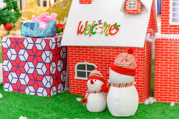 Christmas houses and snowmen horizontal composition