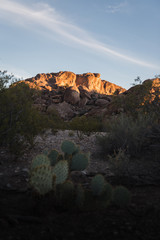 Rocks lit up during sunset at Hueco Tanks, Texas. 
