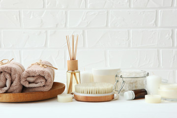 spa composition with towels and care products on the table with place for text. Body care, relaxation