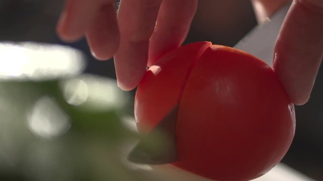 Stock video footage cut thin slices of tomato