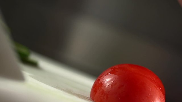 Stock video footage cut thin slices of tomato