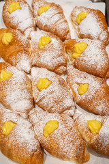 Tasty croissants with cream. Cream croissant. cornetto soft and sweet cream. cream brioche