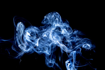 Fototapeta premium Abstract motion of white smoke isolated on a black background Can be modeled as hot food, smog, small clouds, and aromatic smoke.