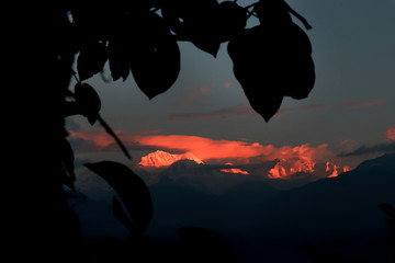 Fototapeta premium Kanchanjungha during golden hour, snow, peak, landscape, nature, Himalayan. Snowy mountains of Himalaya. A beautiful snowy mountain landscape under a blue cloudy sky..
