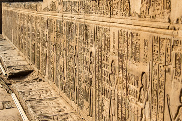 Ruins and Hieroglyphs in the famous Temple of Kom Ombo in Egypt on nile river bank
