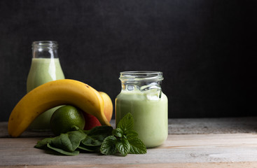 Homemade healthy smoothy made of spinach,banana and apple.