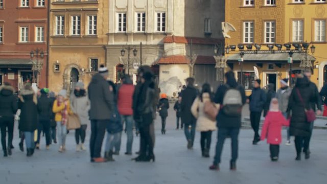 Unrecognizable people in the european city.