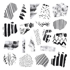 Collection of ripped decorative ink painted paper