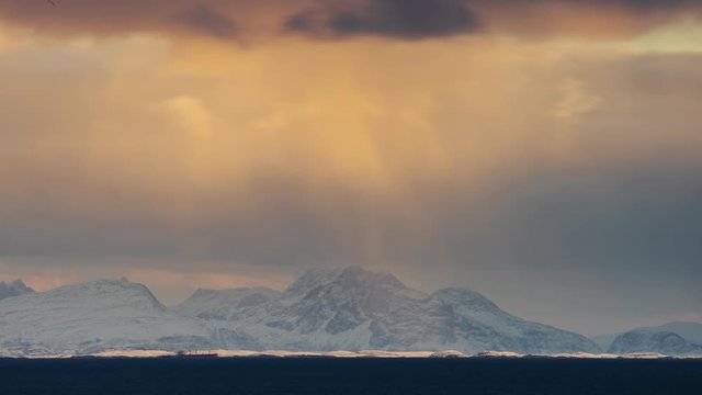 Time lapse of Helgeland coast as seen from Tr&aelig;na in winter with big ship crossing, Northern Norway