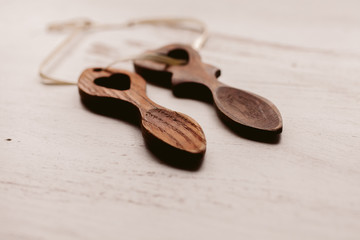 Traditional welsh wooden spoon in white background. Wooden love spoon. 