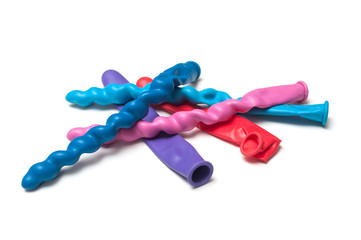Closeup of colorful inflatable balloons on white background