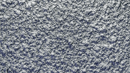 Texture, wall, concrete background. Wall fragments with rough scratches and cracks