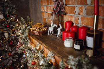 Beautiful holiday decorated home room with Christmas tree and gifts under it.
