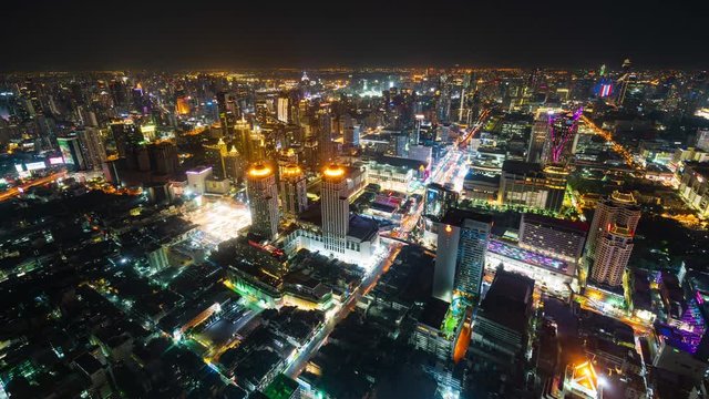 time lapse of Bangkok city downtown and road traffic at night of Thailand , Cityscape