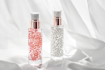 Skincare serum and make-up primer gel bottle, moisturizing lotion and lifting cream emulsion,...