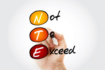 NTE - Not To Exceed acronym with marker, business concept background
