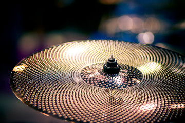 The hang or the jazz drum sparkless in a blue background, romantic background, and dark background.