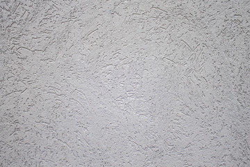 Background image of a wall with decorative plaster