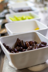 Breakfast buffet at the hotel with fruit bowls.