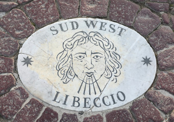 tile with face in Saint Peter Square in Vatican City with names