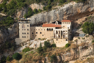 Fototapeta na wymiar Monasteries along the valley of Qadisha. Valley of Qadisha, Lebanon - June, 2019