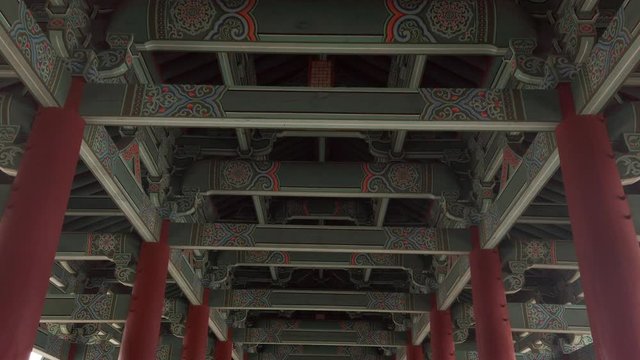 Scenic cinematic slow motion video of Woljeonggyo Bridge over Hyeongsan River in Gyeongju in South Korea. Beautiful summer cloudy look of colorful traditional asian style bridge in Republic of Korea.