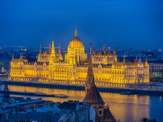 Fototapeta na wymiar The night view of Hungarian Parliament Building in Budapest