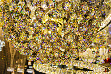 Close up Crystal lamp texture. It's so beautiful of golden reflection light.