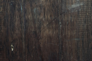 Old brown wood panel with decay