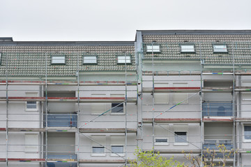 Scaffolding installed on a residential building for the restoration of the facade