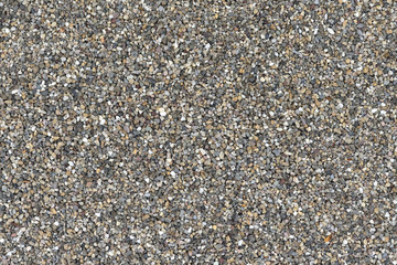 Texture of small pebbles for sidewalks and paths in the garden, closeup