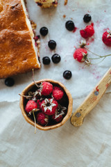 Decorated breakfast setup - Homemade fruit cake with raspberries