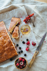 Decorated breakfast setup - Homemade fruit cake with raspberries