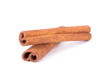 Cinnamon Sticks Stacked isolated on White background closeup macro shot